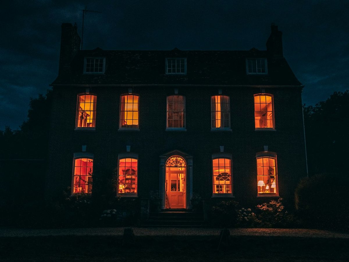 A manor with red windows