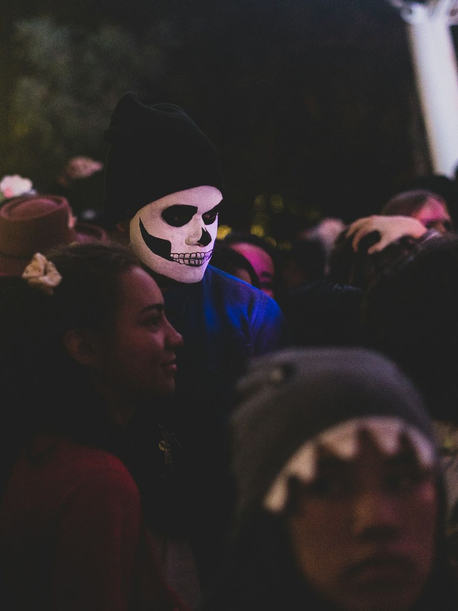 Masked actors in the dark