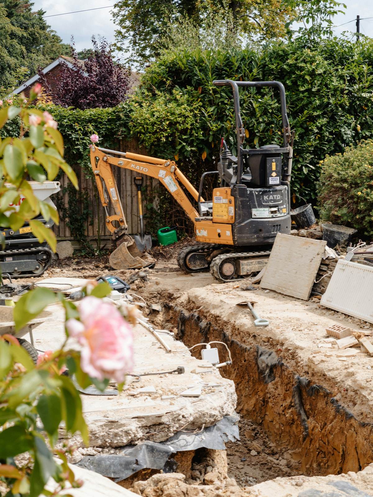 The crew trenching a new line to a valve box