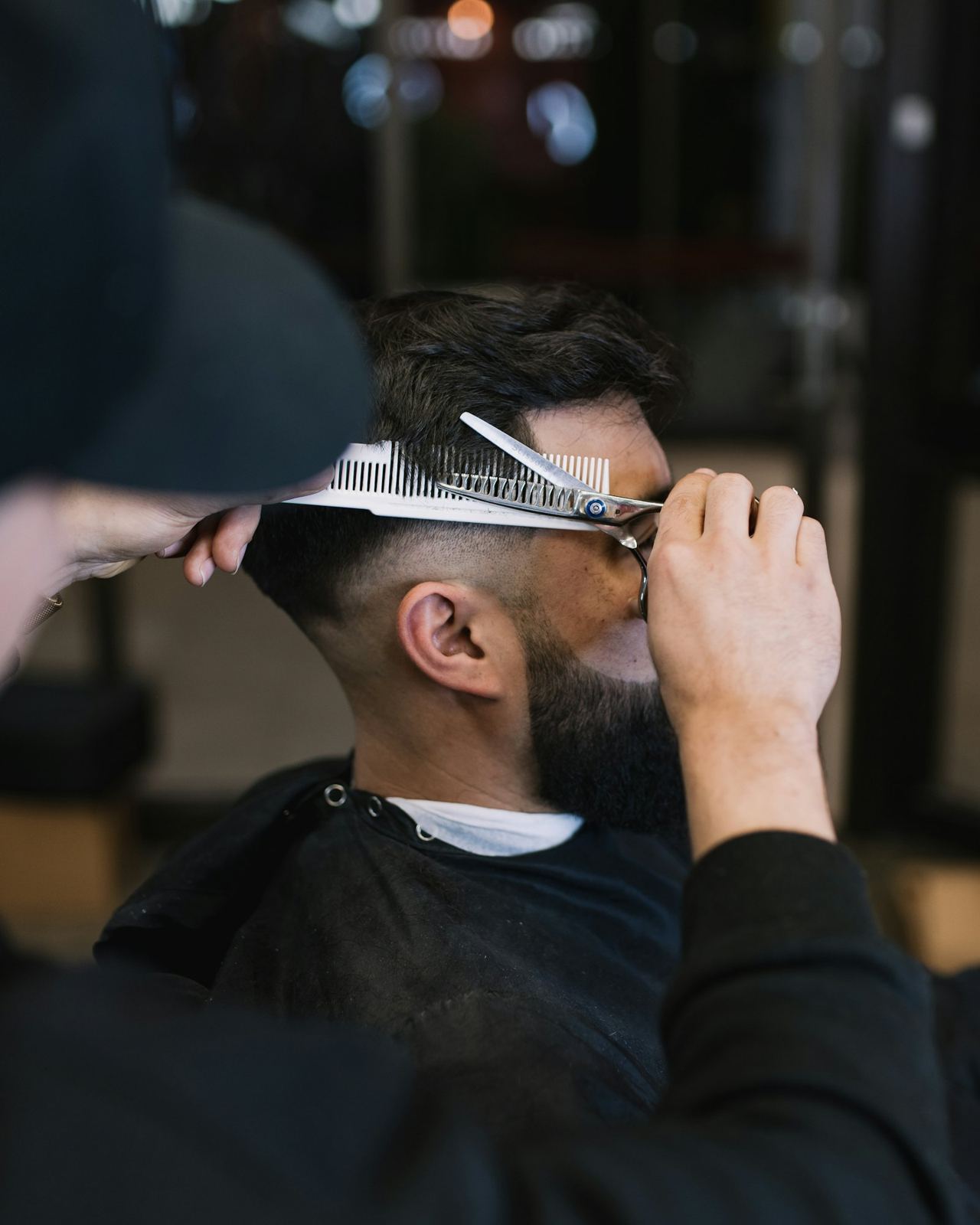 A scissor cut in progress