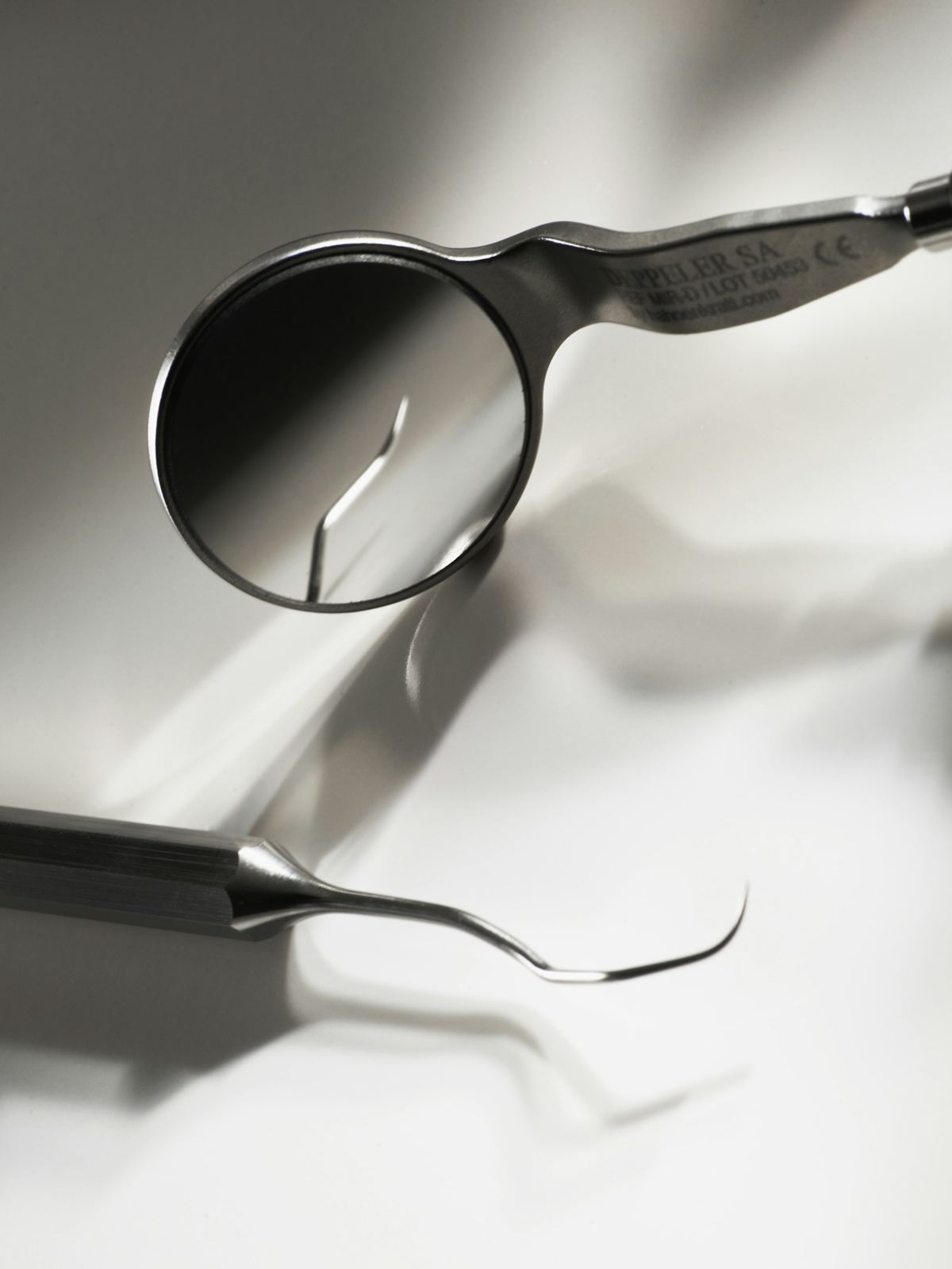 A dental mirror and explorer