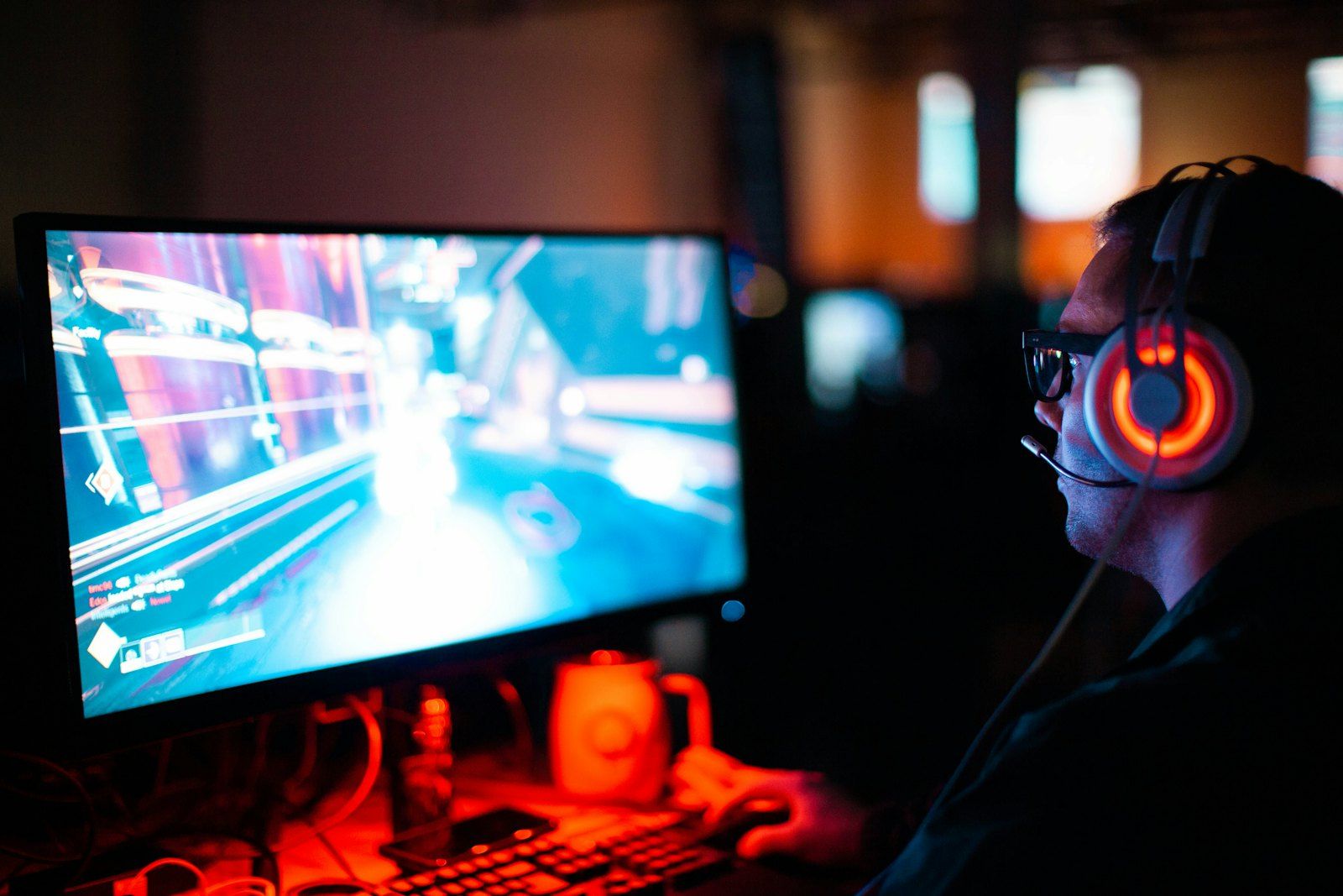 Player in a glowing headset