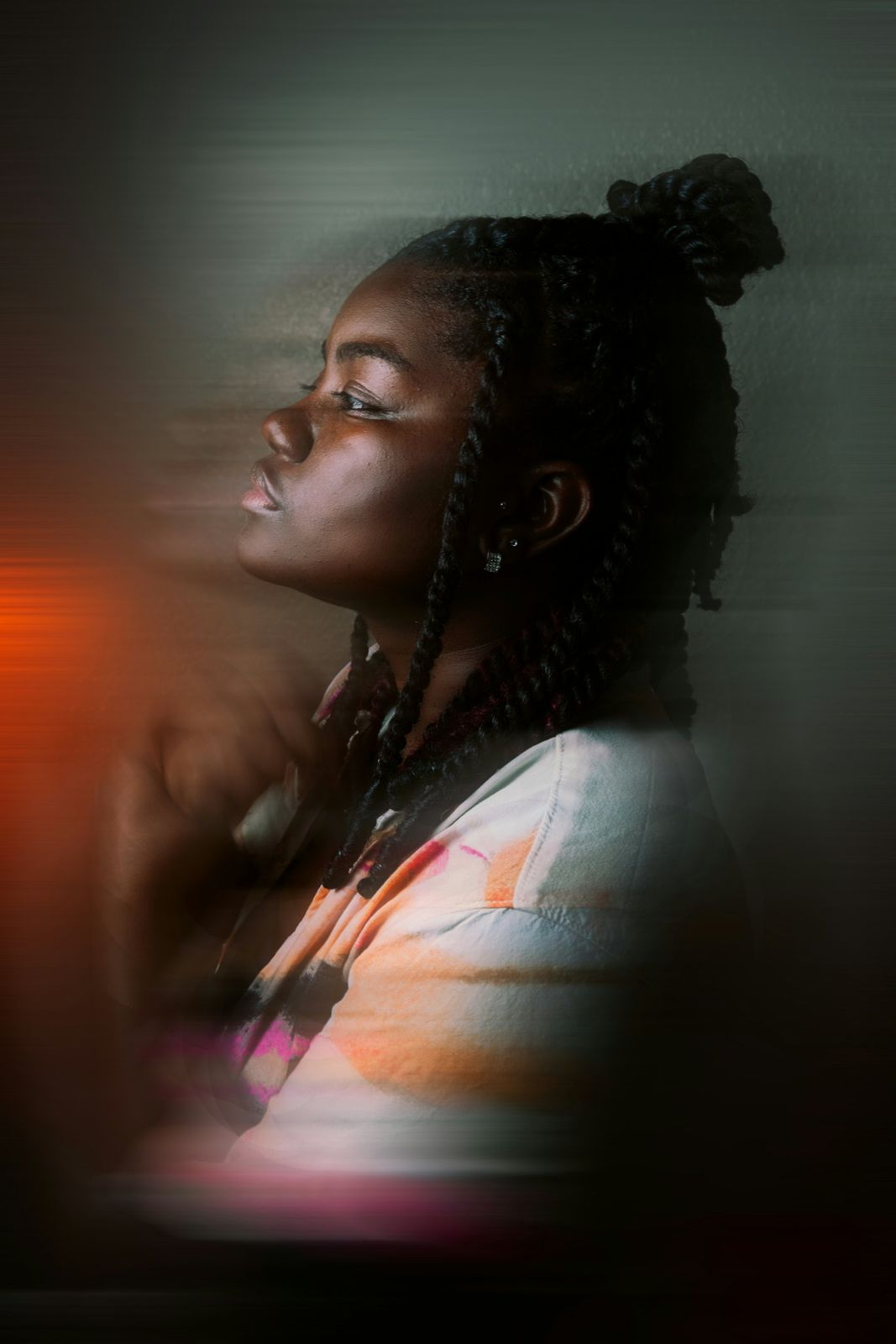 A motion-blurred portrait in warm light