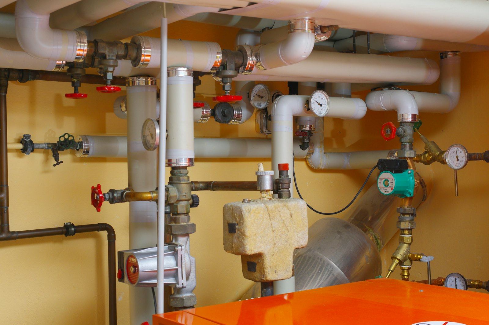 A boiler with pipes and gauges