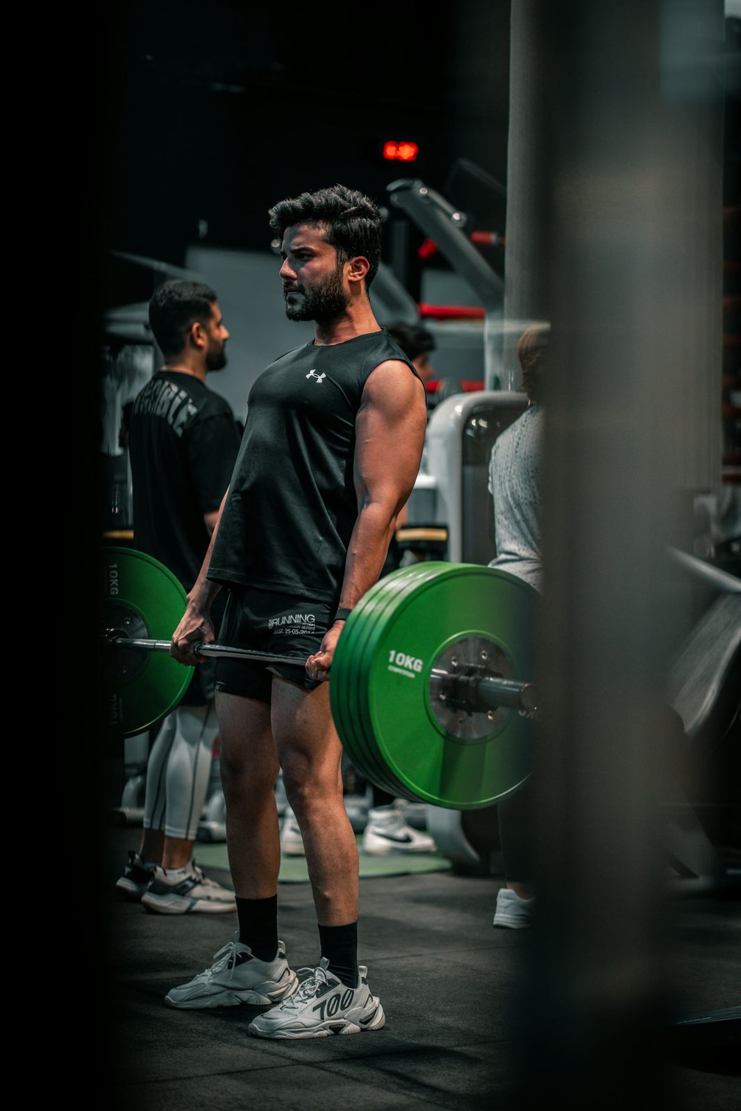 A man at the top of a deadlift