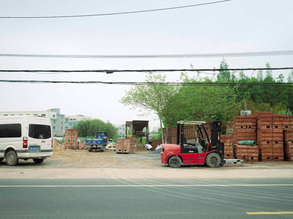 Pallets of roofing shingles in the yard