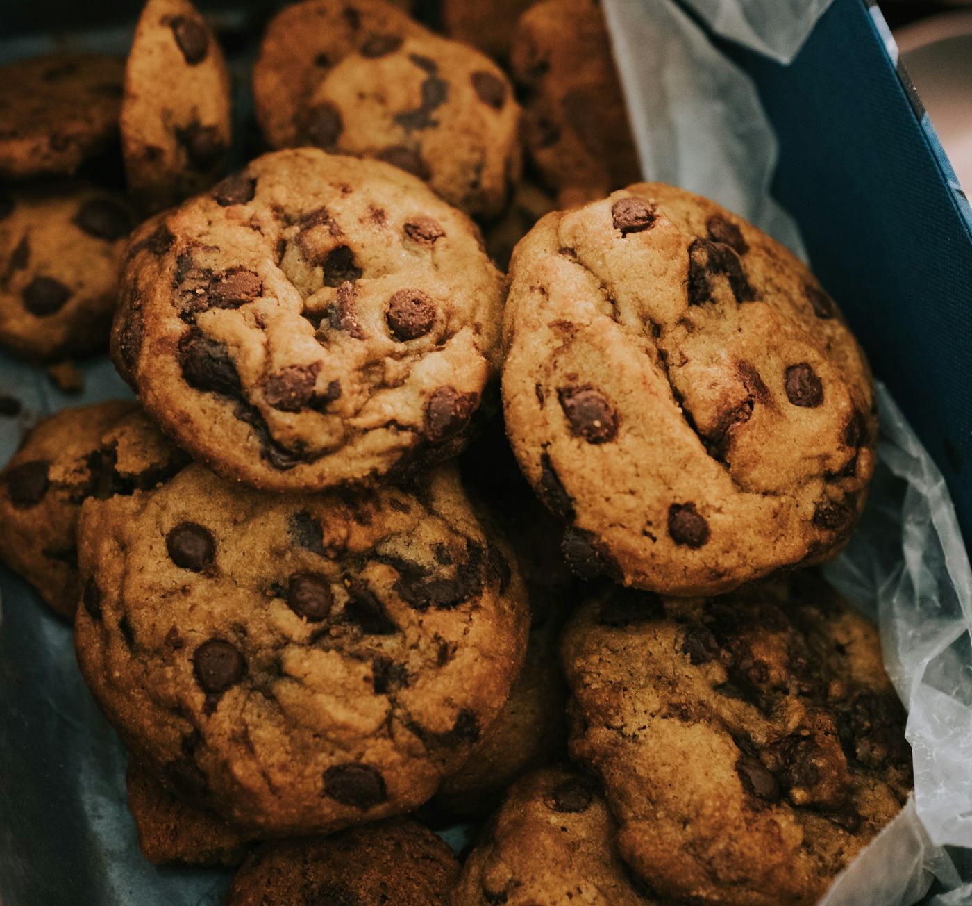 Photo: walnut chunk cookies on parchment