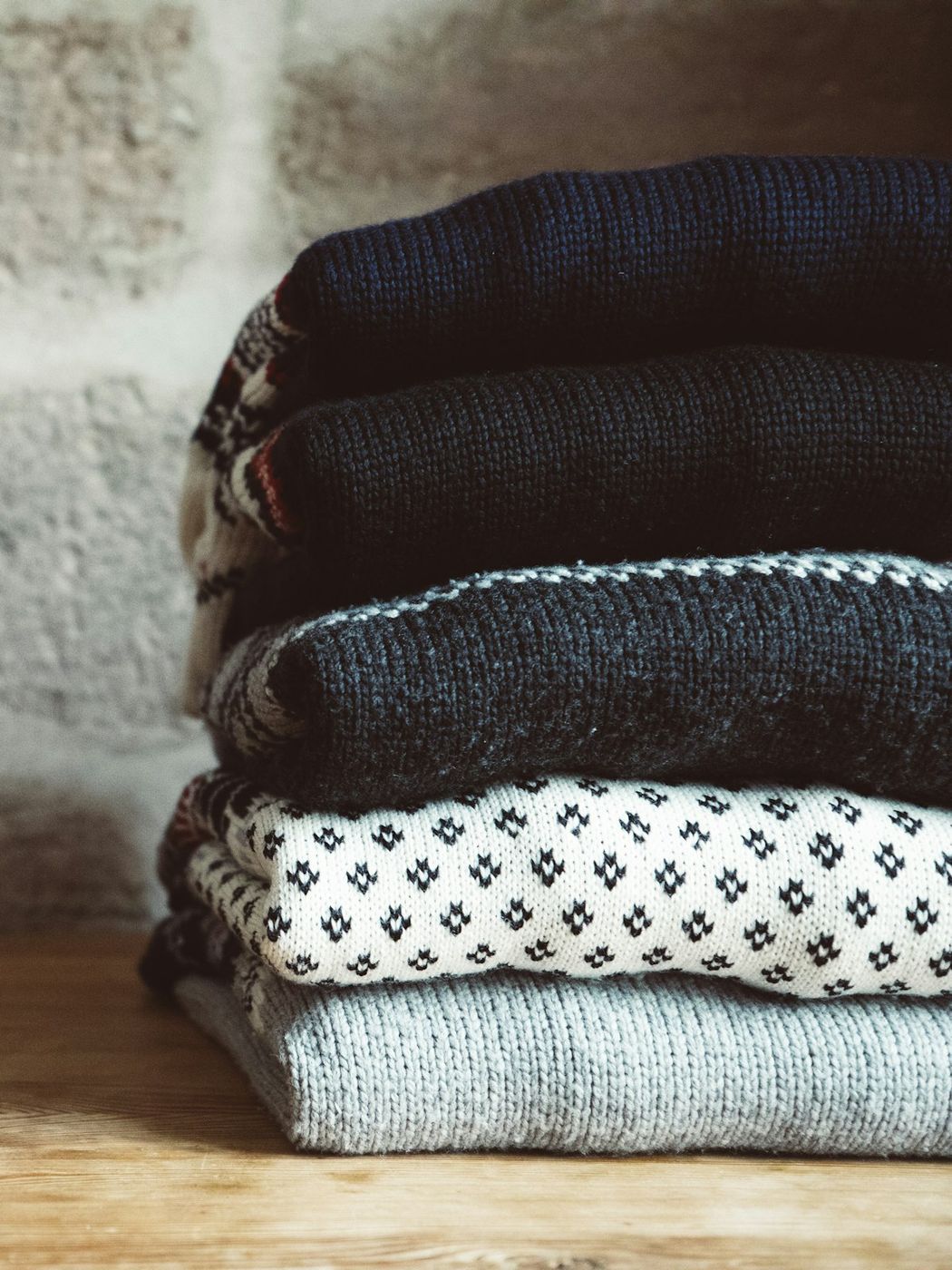 Photo: a folded navy long-sleeve tee